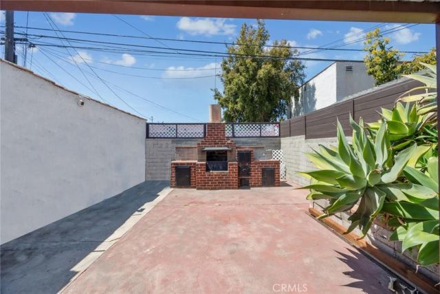 7037 Cimarron Street, Los Angeles, CA 90047