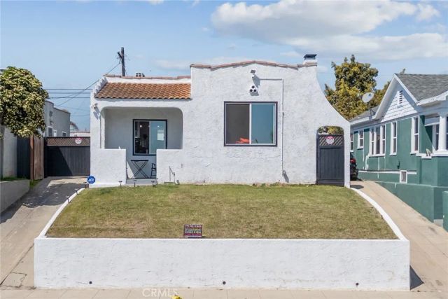 7037 Cimarron Street, Los Angeles, CA 90047