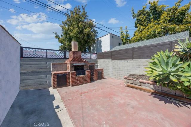 7037 Cimarron Street, Los Angeles, CA 90047