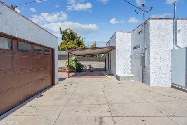 7037 Cimarron Street, Los Angeles, CA 90047