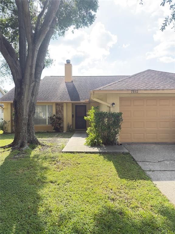 7112 HOLLOWELL DRIVE, Tampa, FL 33634