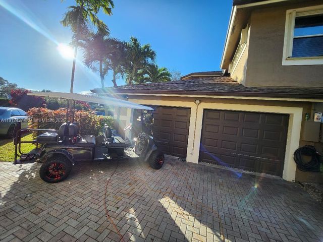 6879 NW 65th Terrace, Parkland, FL 33067