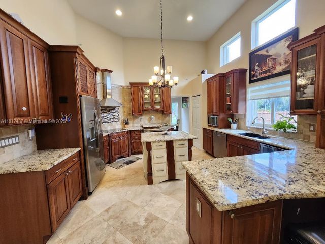 6879 NW 65th Terrace, Parkland, FL 33067