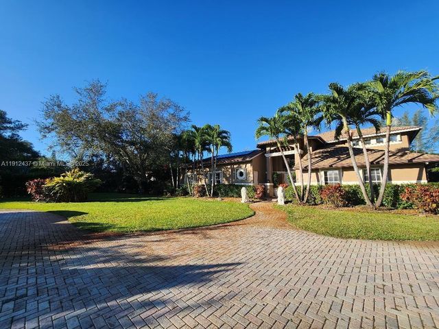 6879 NW 65th Terrace, Parkland, FL 33067