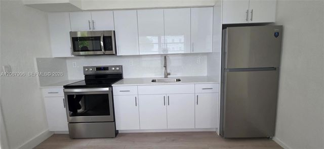 21 NW 32nd Court, Miami, FL 33125