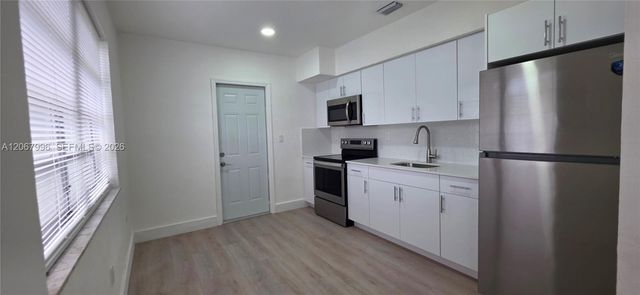 21 NW 32nd Court, Miami, FL 33125