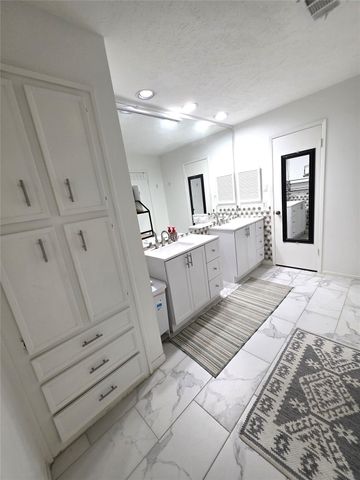 8827 Woodleigh Drive, Houston, TX 77083