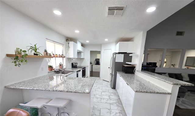8827 Woodleigh Drive, Houston, TX 77083