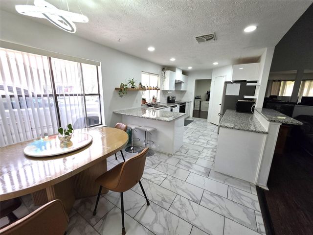 8827 Woodleigh Drive, Houston, TX 77083