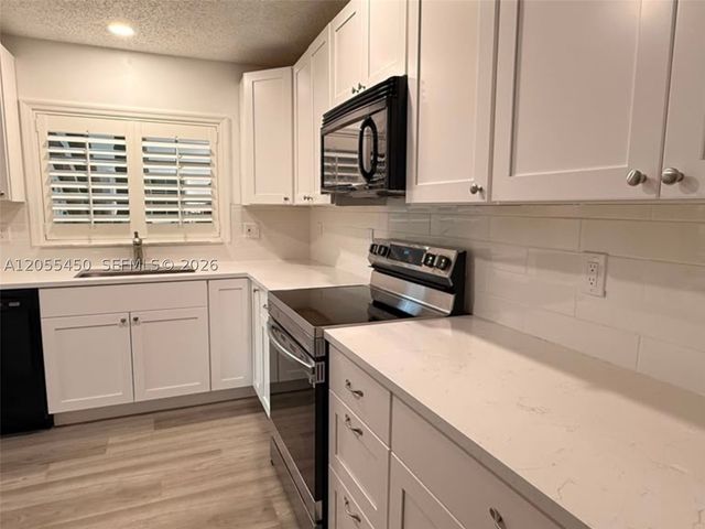 7370 NW 61st Ter, Parkland, FL 33067