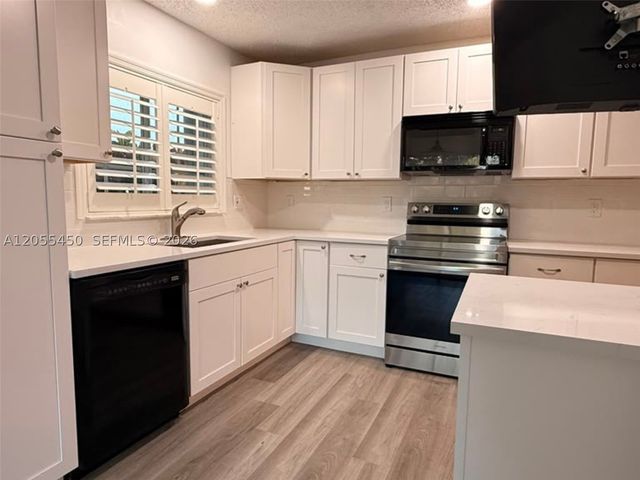 7370 NW 61st Ter, Parkland, FL 33067