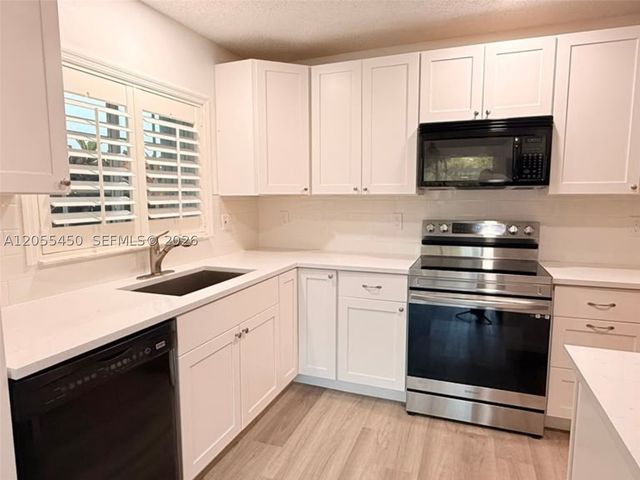 7370 NW 61st Ter, Parkland, FL 33067