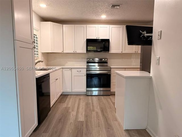 7370 NW 61st Ter, Parkland, FL 33067