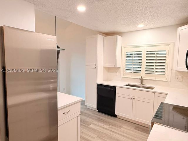 7370 NW 61st Ter, Parkland, FL 33067