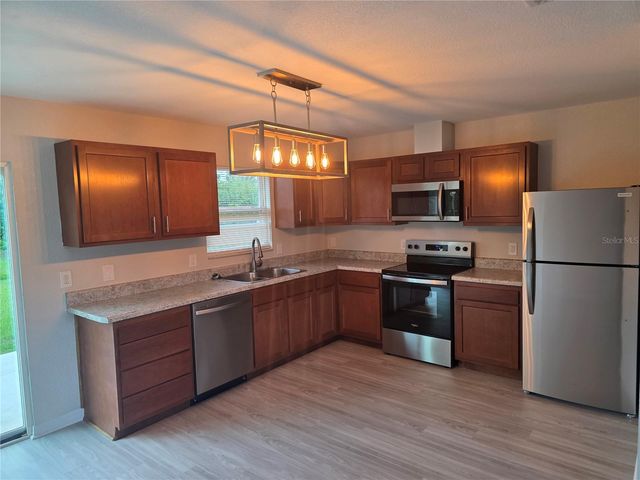 12240 GROUSE AVENUE, Port Charlotte, FL 33981