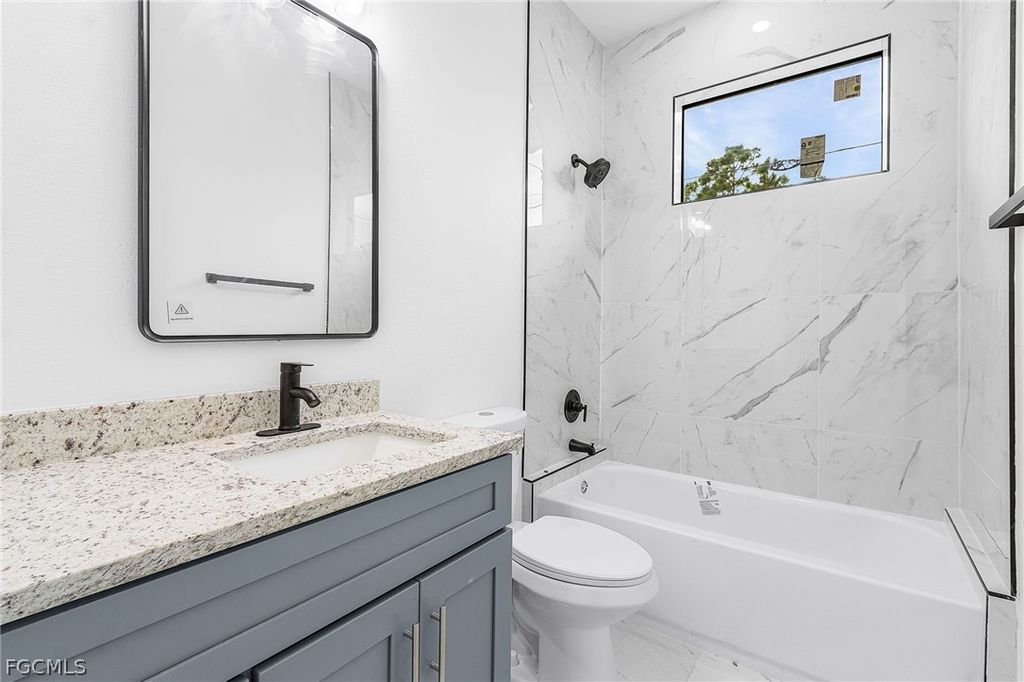 Image 9 of property listing at 614 NW 9th ST, Cape Coral, FL 33993