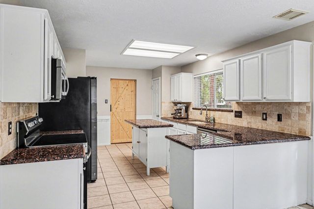 1418 Green Tree Drive, Tomball, TX 77375