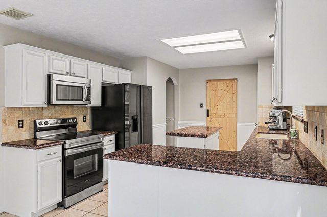 1418 Green Tree Drive, Tomball, TX 77375
