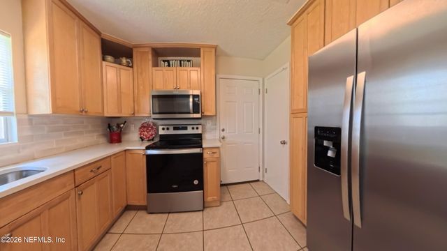 214 E TEAKWOOD Circle, Middleburg, FL 32068