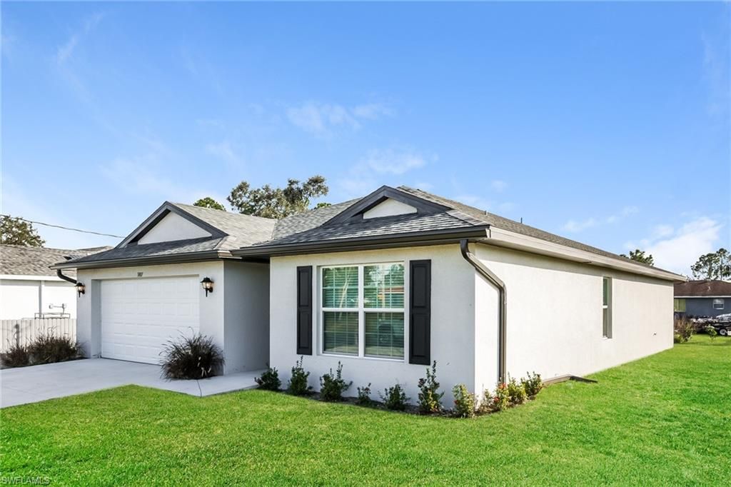 3807 8th ST SW, LEHIGH ACRES, FL 33976 — photo 2