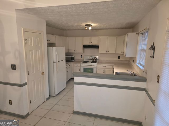 5450 Hedgeflower Court, Stone Mountain, GA 30088