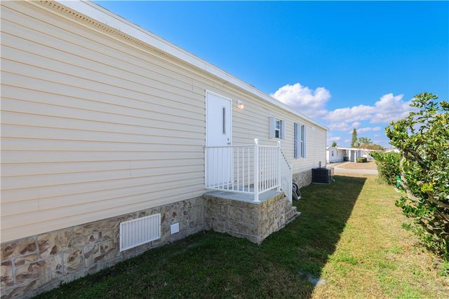 929 Thrush Circle, Barefoot Bay, FL 32976