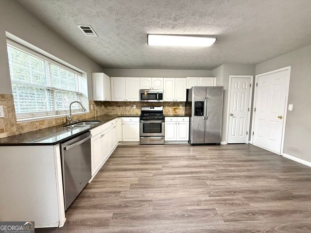 1563 Oak Park Court, Suwanee, GA 30024