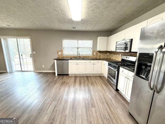 1563 Oak Park Court, Suwanee, GA 30024