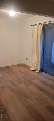 2 Williamsburg Court C, Ridge, NY 11961