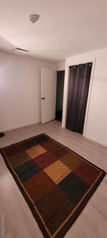 2 Williamsburg Court C, Ridge, NY 11961