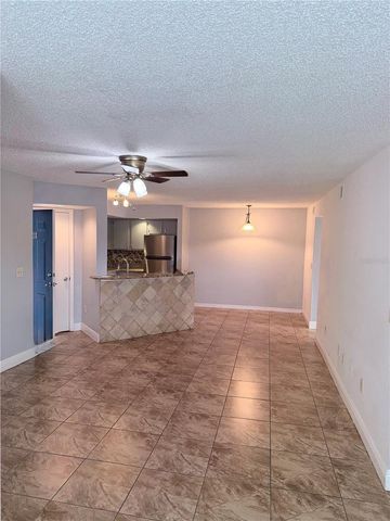 5713 GATLIN AVENUE 218, Orlando, FL 32822