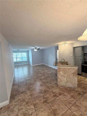 5713 GATLIN AVENUE 218, Orlando, FL 32822