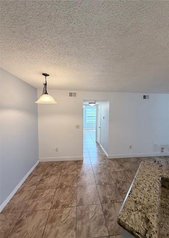 5713 GATLIN AVENUE 218, Orlando, FL 32822