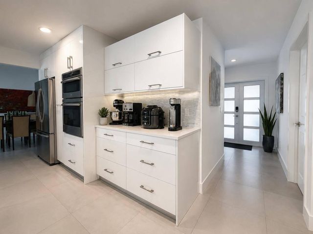 111 Camelot Court, Royal Palm Beach, FL 33411