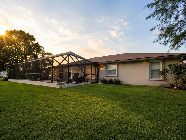 111 Camelot Court, Royal Palm Beach, FL 33411