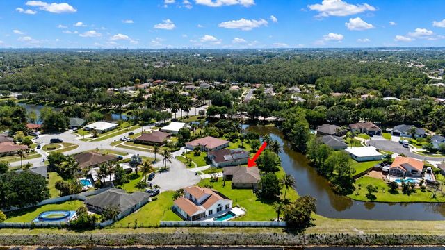 111 Camelot Court, Royal Palm Beach, FL 33411