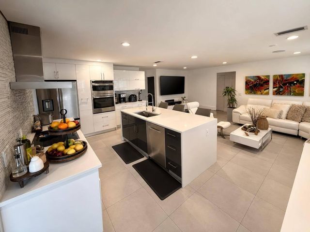 111 Camelot Court, Royal Palm Beach, FL 33411
