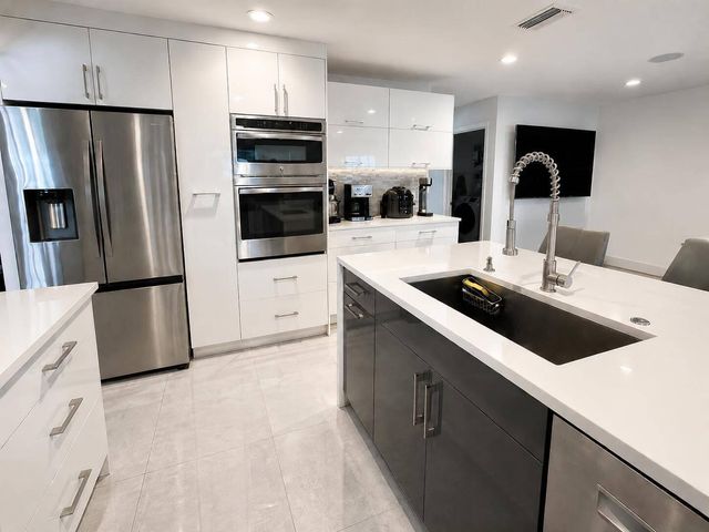 111 Camelot Court, Royal Palm Beach, FL 33411