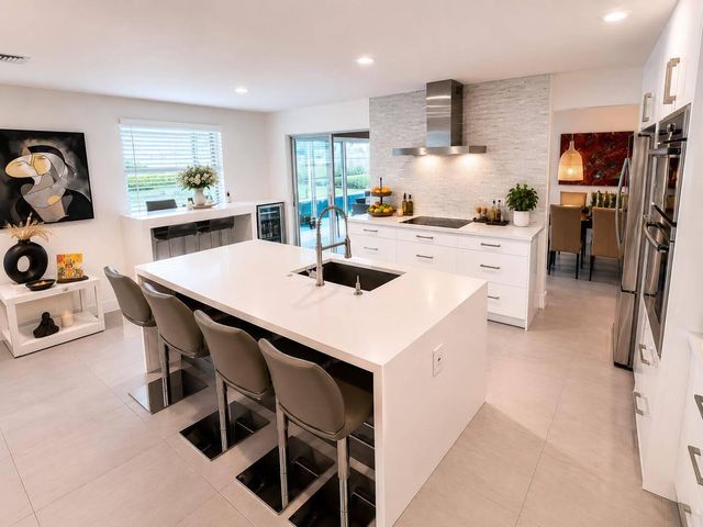 111 Camelot Court, Royal Palm Beach, FL 33411