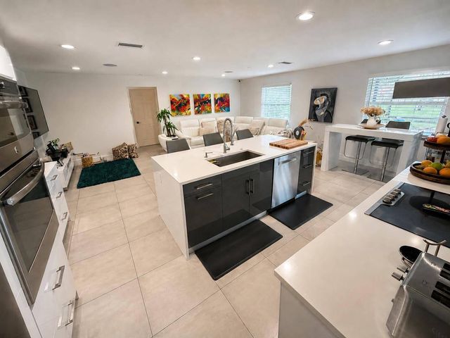 111 Camelot Court, Royal Palm Beach, FL 33411