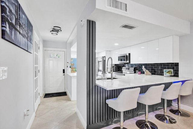 868 Crystal Lake Drive, Deerfield Beach, FL 33064