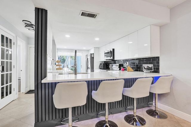 868 Crystal Lake Drive, Deerfield Beach, FL 33064