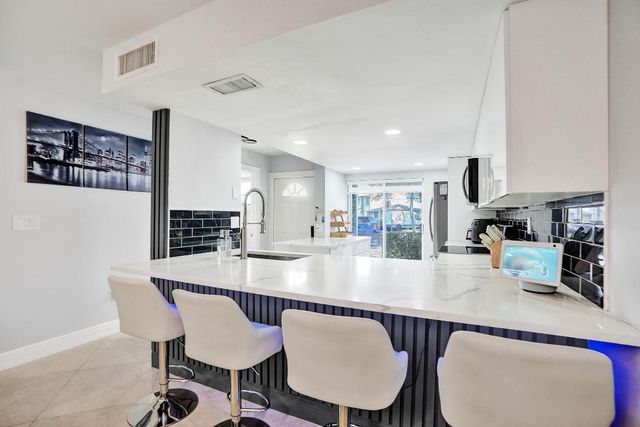 868 Crystal Lake Drive, Deerfield Beach, FL 33064