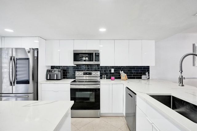 868 Crystal Lake Drive, Deerfield Beach, FL 33064