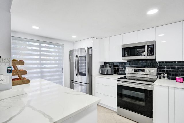 868 Crystal Lake Drive, Deerfield Beach, FL 33064