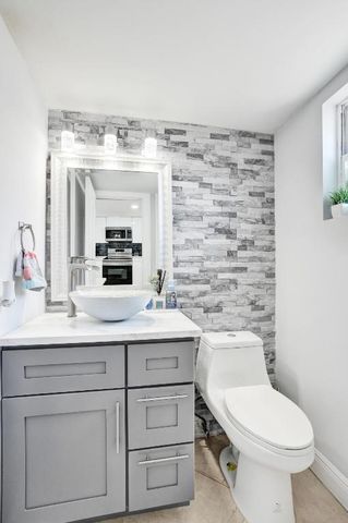 868 Crystal Lake Drive, Deerfield Beach, FL 33064