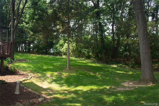7781 Partridge Hill Drive, Hamburg Township, MI 48116