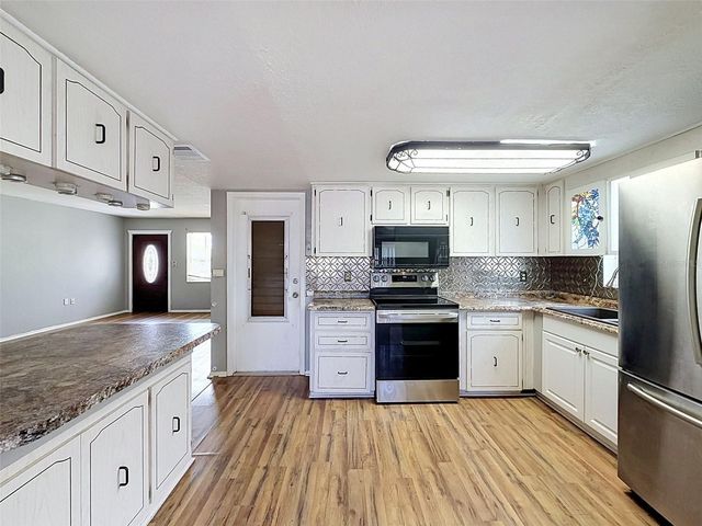 9151 BARRINGTON LANE, Port Richey, FL 34668