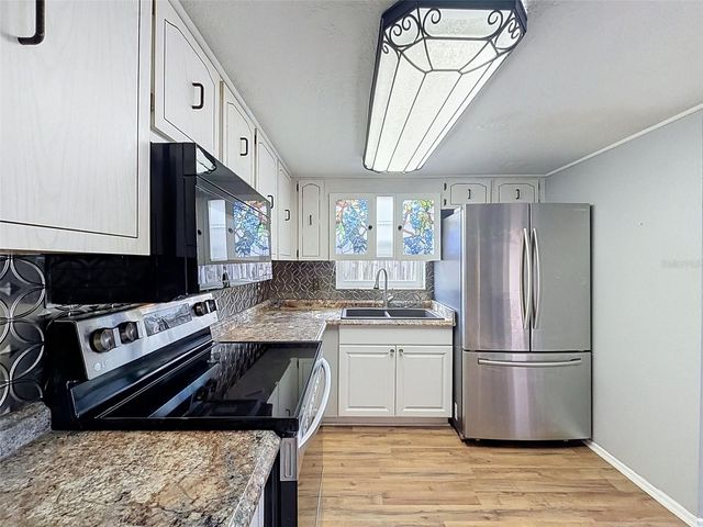 9151 BARRINGTON LANE, Port Richey, FL 34668