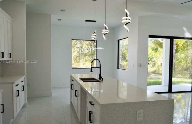 1116 Eight Street, Lehigh Acres, FL 33972